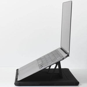 MacBook Air on laptop stand