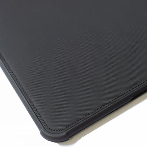 Detailed view of PU leather on TILT laptop case with built-in stand