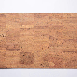 Overhead view of tan cork leather laptop desk pad