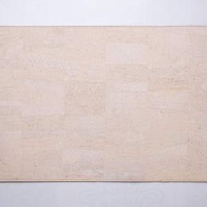 Overhead view of white cork leather laptop desk pad